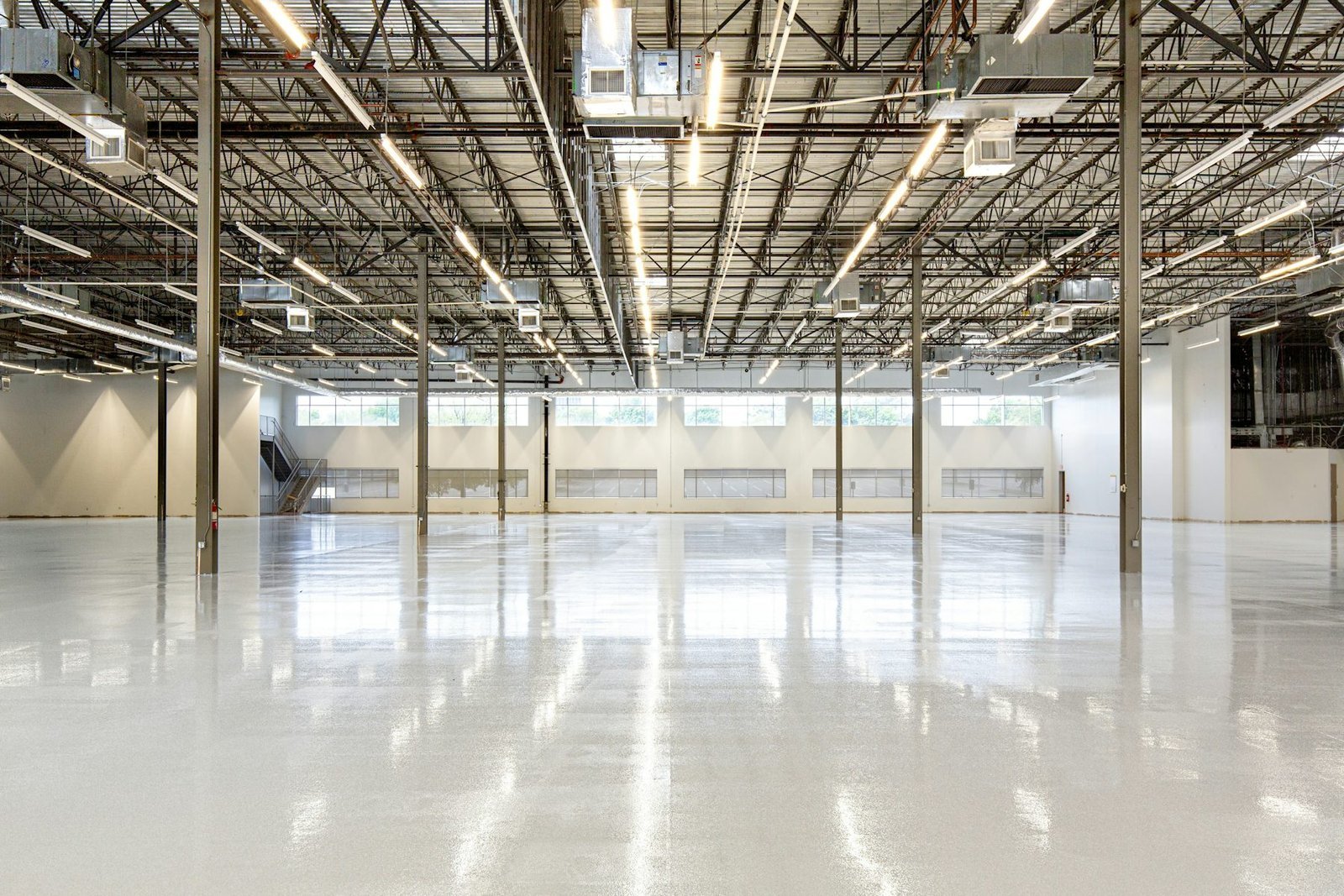Spacious commercial facility with exposed building systems