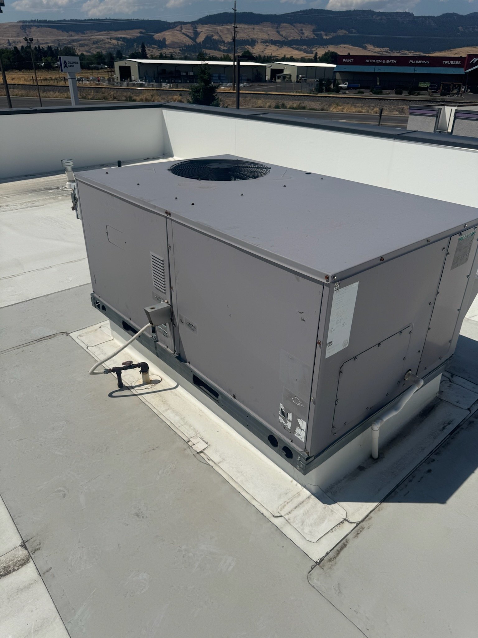Full rooftop HVAC unit at a commercial property